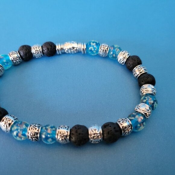 NWT Mens Glow In The Dark Stretch Bracelet. Black Lava Rock Blue Firefly Glass - Picture 2 of 11
